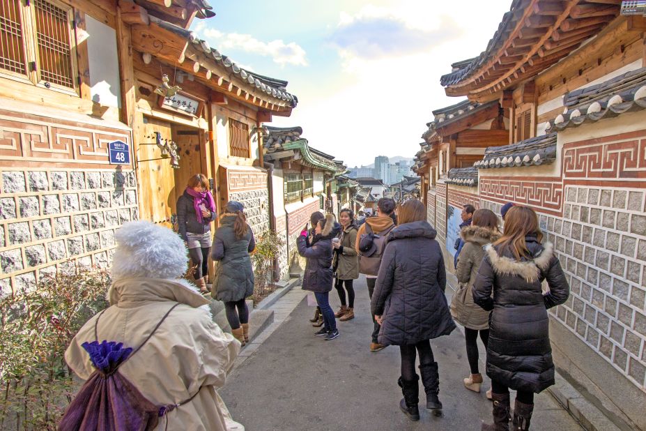 This photo of Seoul's last hanok-only street was taken by David Kilburn, a British expatriate and hanok expert who campaigns for their preservation. "A city the size of Seoul, with the wealth of Seoul, should find it within its resources to protect and preserve at least one street of traditional houses to show how people lived and worked a hundred or more years ago," he says.