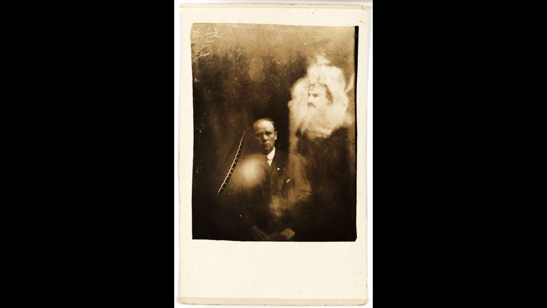 A man's face appears like an apparition over a clergyman's photo. These photos came from an album that was unearthed in a secondhand bookstore by a curator of England's National Media Museum.