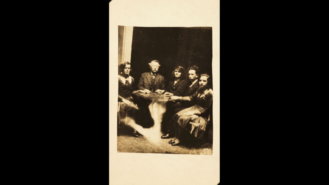 A table is seemingly lifted by a ghostly arm during a seance. Harry Price, from the Society of Psychical Research, reported on Hope's deception in 1922. There was also <a href="https://babel.hathitrust.org/cgi/pt?id=pst.000063000252;view=1up;seq=664" target="_blank" target="_blank">an article</a> in Scientific American magazine that year that called Hope "a common cheat who obtains money under false pretenses."
