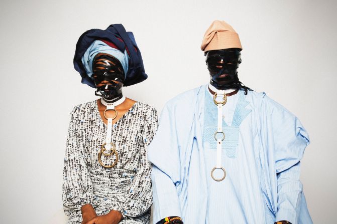 Photograph from a series titled, Are You Ok? Ogunbanwo's lens often focuses on West Africa's high-end fashion industry. His series on men's hats in Nigeria was featured in Vogue earlier this year. The images pictured here push the country's conventional views on taste and decency by photographing Nigerians dressed in traditional garments but combined with fetish wear. 