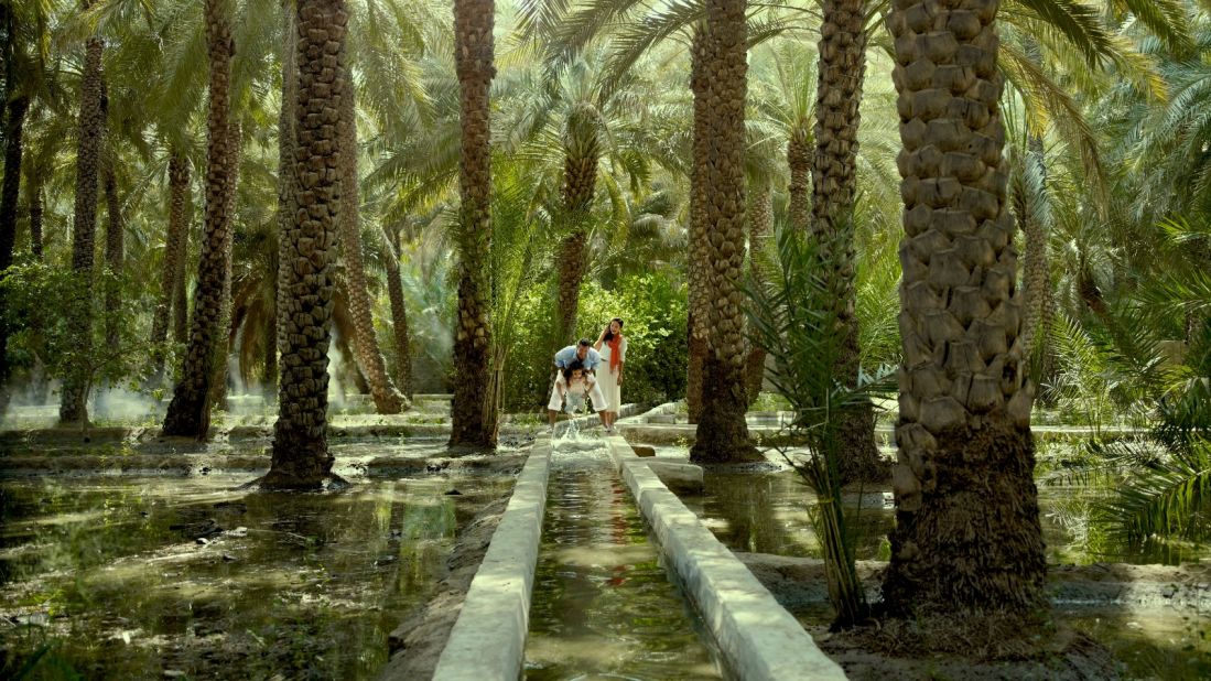 Visitors can cool off in the oasis in the center, next to the Al Ain National Museum, which is filled with date palm plantations, water features and shaded walkways.