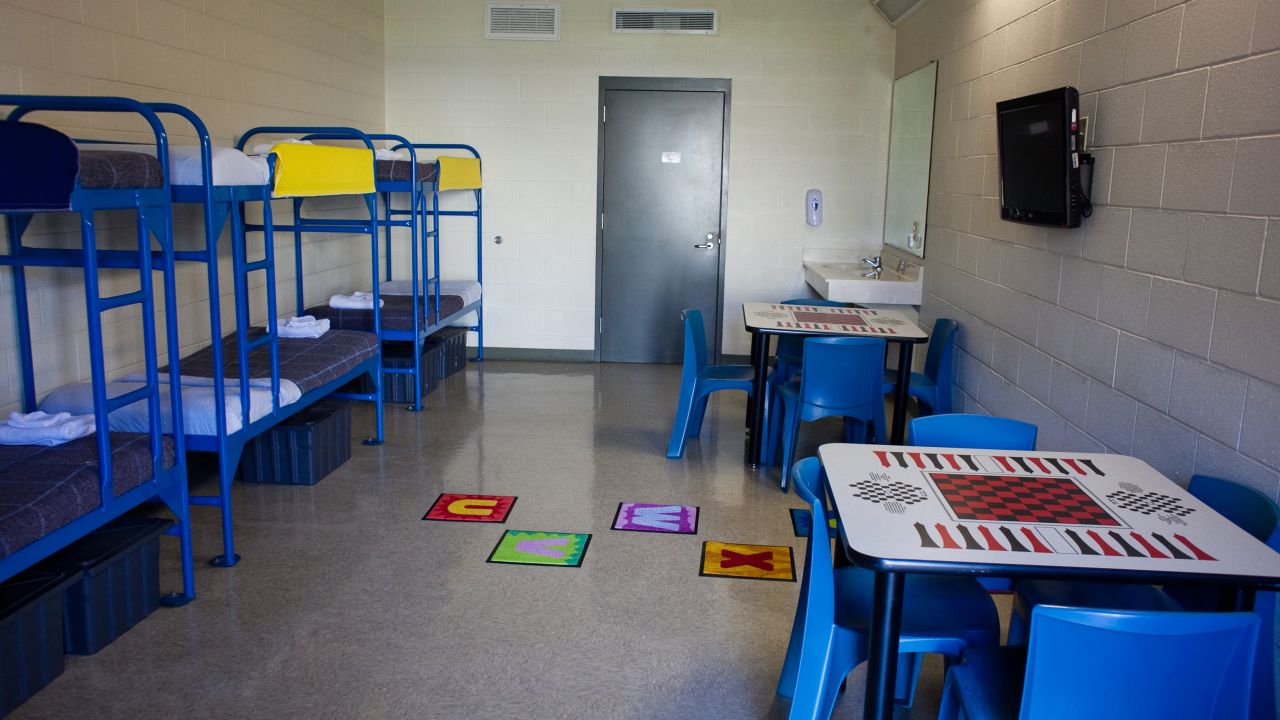 A photo from July 2014 shows a room inside the Karnes County residential center.