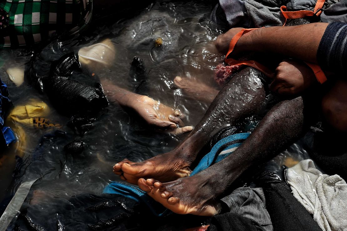 Bodies of migrants in a boat off the coast of Libya in October. At least 29 people died in the incident, all in their 20s.