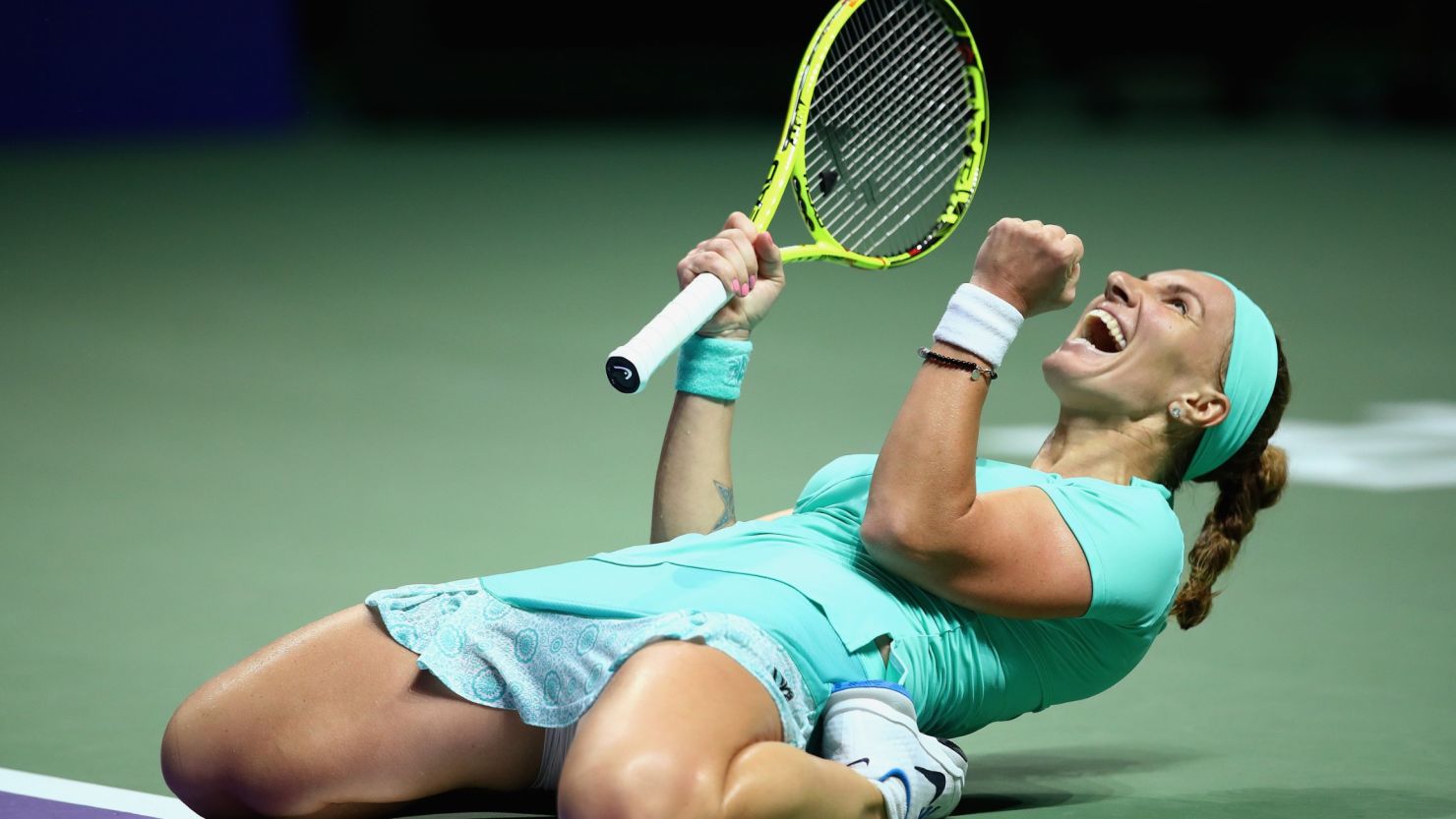 Svetlana Kuznetsova celebrates after beating Karolina Pliskova in three sets in Singapore. 