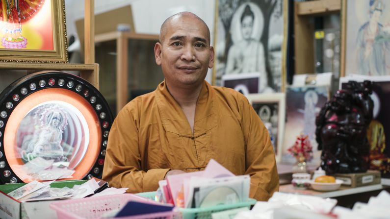 Hong Kong City Mall also features specialty shopping. Thich Minh Chon is a shopkeeper selling Buddhist gifts and literature.