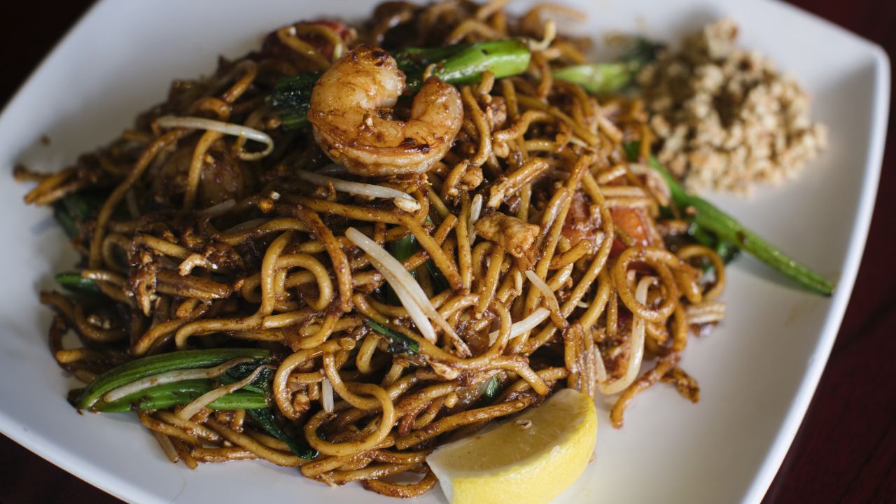 A fried noodle dish, mee goreng, is on the menu at Mamak Malaysian restaurant. 