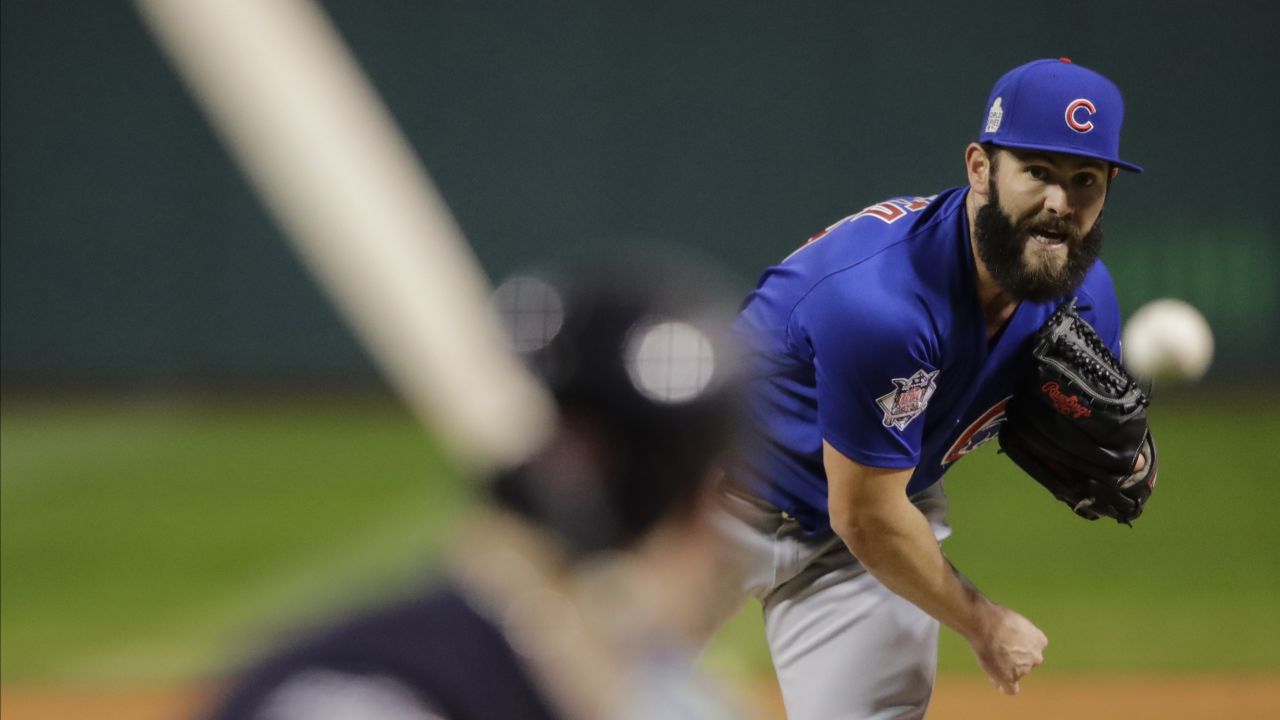 Chicago Cubs starting pitcher Jake Arrieta throws during the first inning of Game 2 .