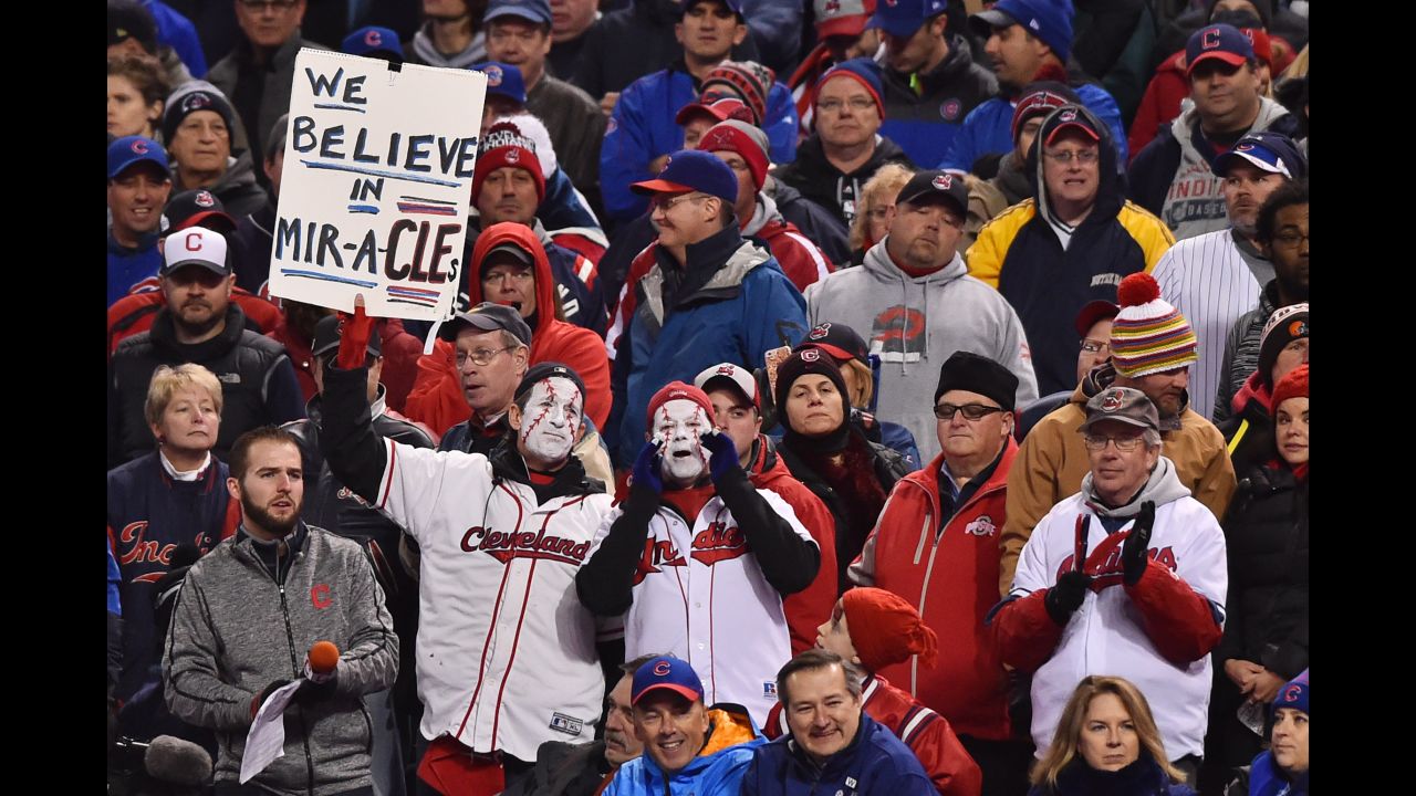 Indians fans hold up a sign in the stands during the sixth inning in Game 2.