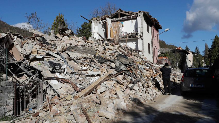 A house was completely destroyed in the small town of Visso in central Italy, Thursday, Oct 27, 2016, after a 5.9 earthquake destroyed part of the town. A pair of strong aftershocks shook central Italy late Wednesday, crumbling churches and buildings, knocking out power and sending panicked residents into the rain-drenched streets just two months after a powerful earthquake killed nearly 300 people. (AP Photo/Alessandra Tarantino)