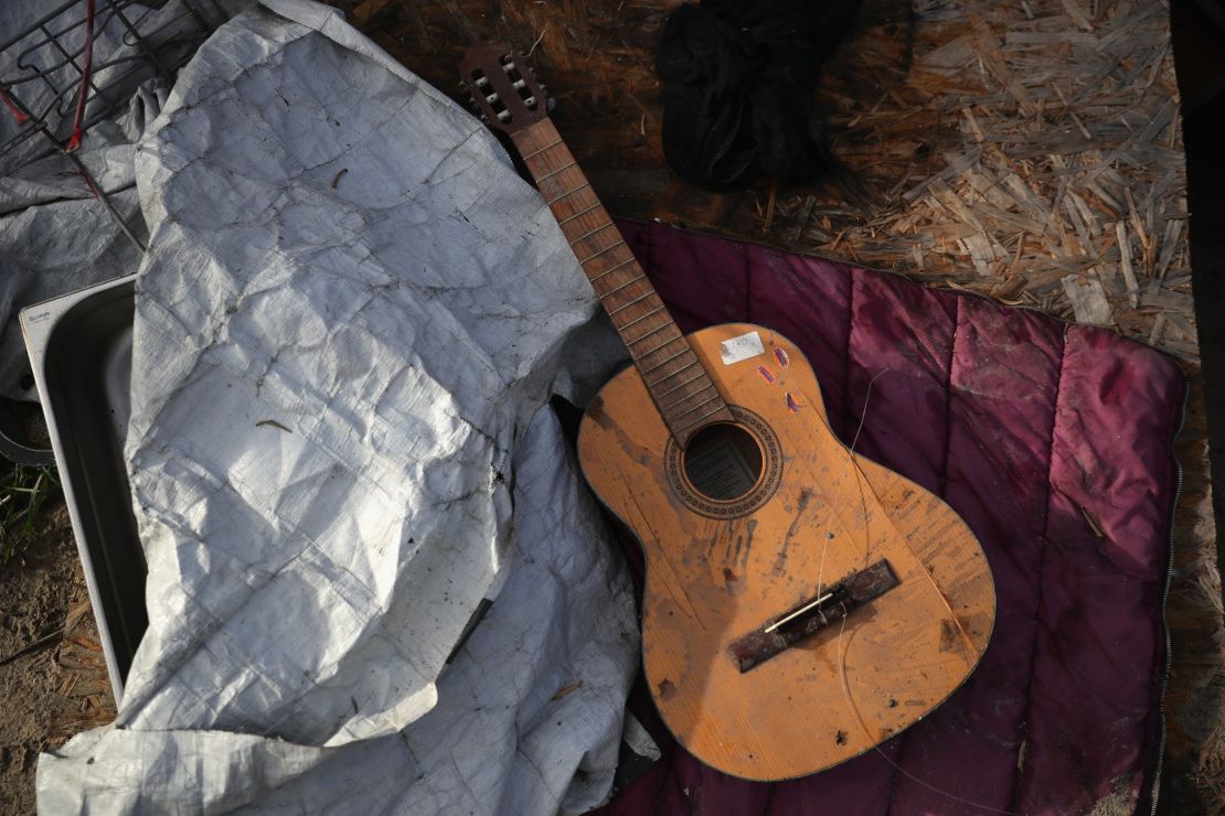 A battered guitar.
