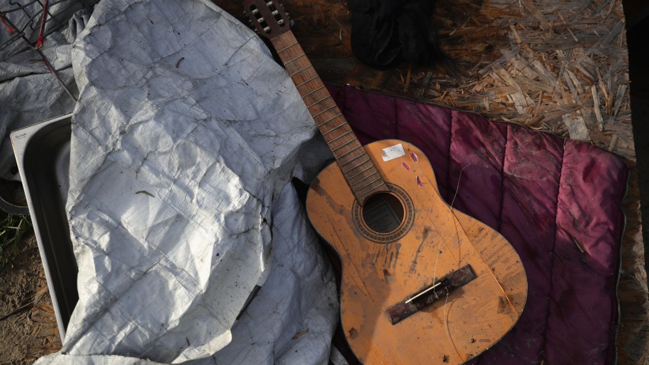A battered guitar.