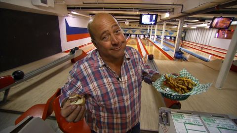 The "Bizarre Foods" host has tasted some interesting culinary treats in his travels to more than 150 countries, but can still appreciate a good burger and fries.