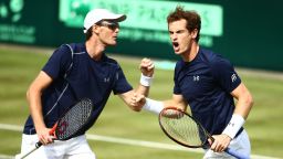 LONDON, ENGLAND - JULY 18:  Andy Murray of Great Britain celebrates winning second set tie break with Jamie Murray of Great Britian against Nicolas Mahut and Jo-Wilfried Tsonga of France in the doubles match during Day Two of the World Group Quarter Final Davis Cup match between Great Britain and France at Queens Club on July 18, 2015 in London, England.  (Photo by Jordan Mansfield/Getty Images for LTA)