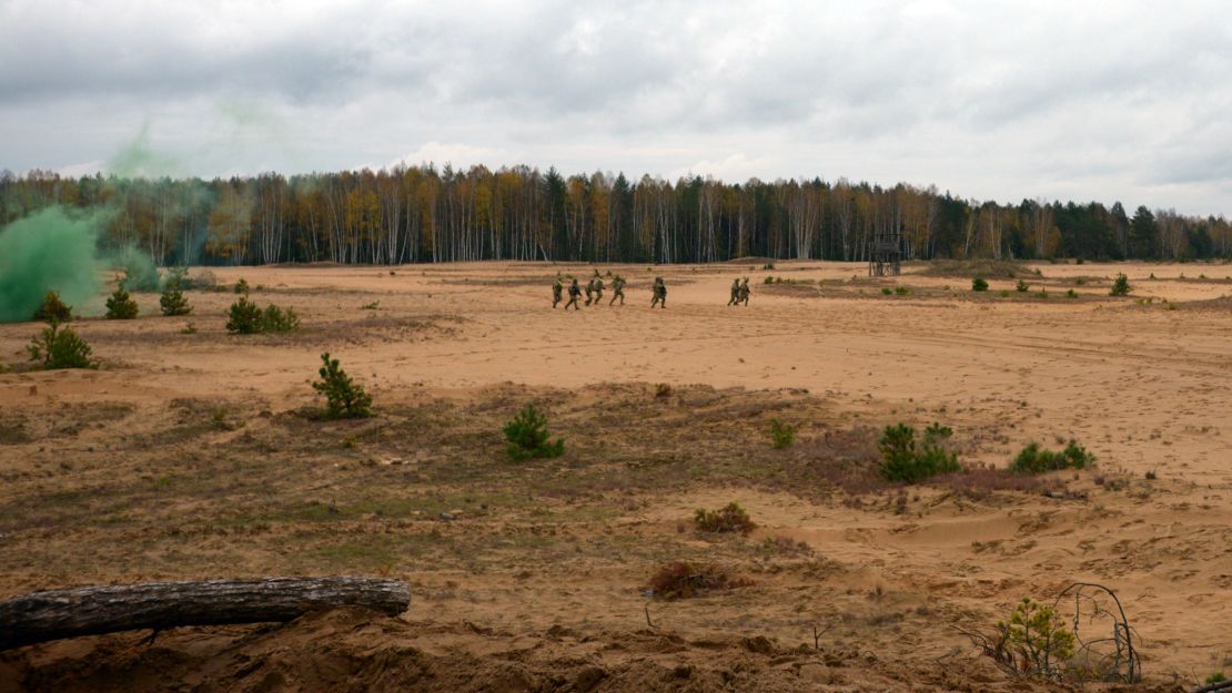 Lithuanian conscripts training alongside US soldiers on a live firing exercise