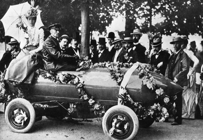 Camille Jenatzy was the first man to exceed 100 kph (62 mph) at Acheres, near Paris in 1899 in an electric car, christened "La Jamais Contente." 