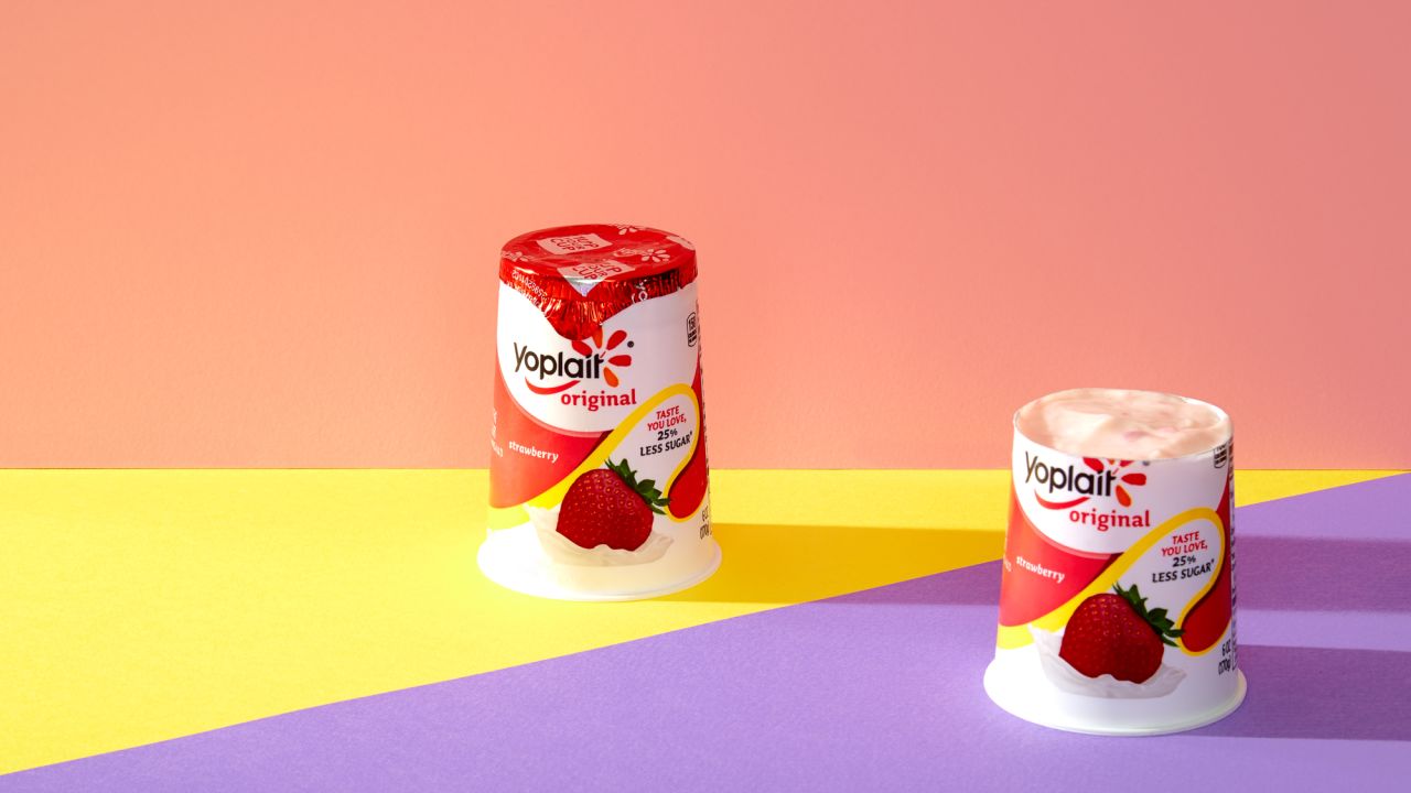 For a standard 6-ounce container of Yoplait yogurt (strawberry), one plus four-fifths of another equals 33 grams of sugar.