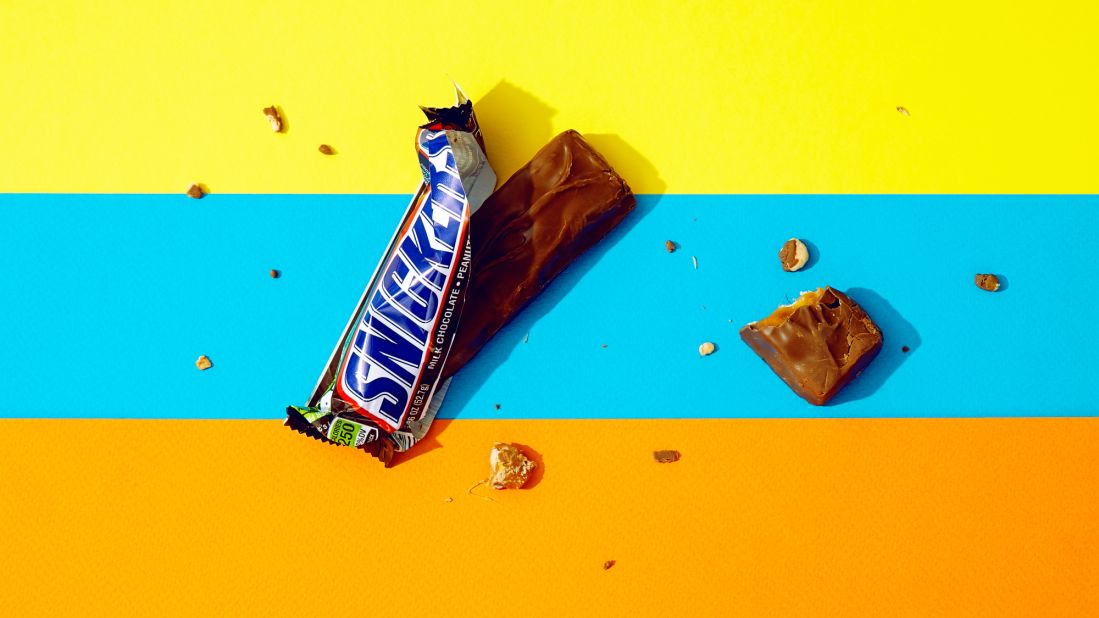 For a standard 52.7-gram Snickers, one plus one-fifth of a bar equals 33 grams of sugar.
