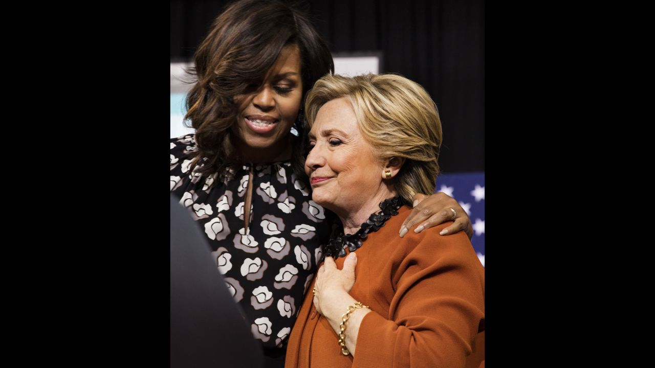 First lady Michelle Obama hugs Clinton at a rally in Winston-Salem, North Carolina, on October 27.