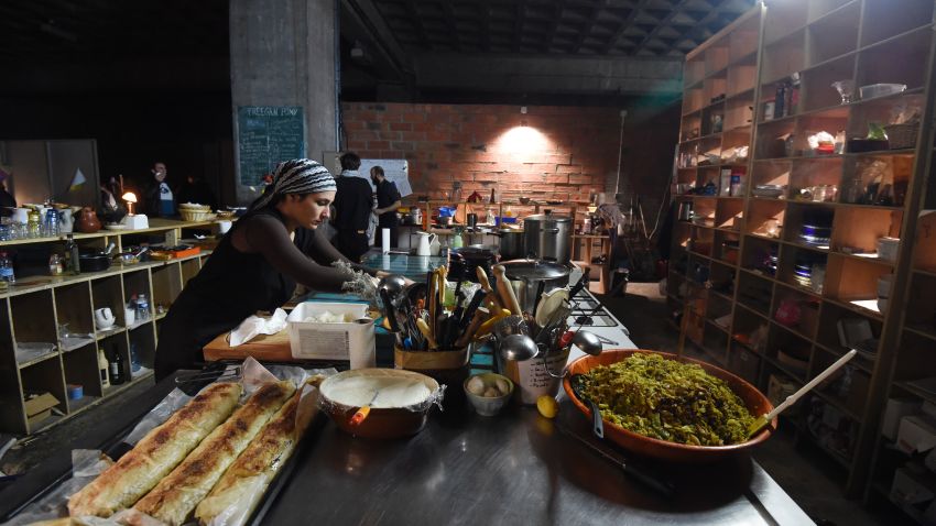 TO GO WITH AFP STORY BY PIERRICK YVON
Picture taken in Paris, on March 25, 2016 shows the kitchen of the squat restaurant "Freegan Pony", which serves food made with leftovers from the Rungis international food market. / AFP / DOMINIQUE FAGET        (Photo credit should read DOMINIQUE FAGET/AFP/Getty Images)