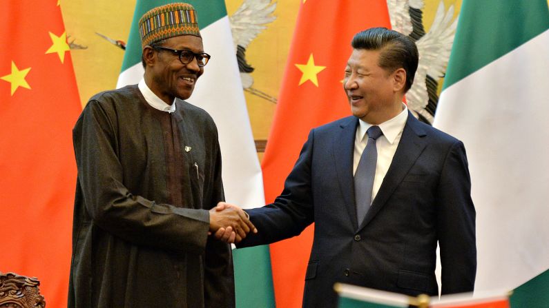 Nigerian President Muhammadu Buhari and Chinese President Xi Jinping shake hands during a signing ceremony at the Great Hall of the People, Beijing, in April, 2016.