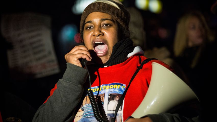 Erica Garner, daughter of Eric Garner,  leads a march of people protesting the Staten Island, New York grand jury's decision not to indict a police officer involved in the chokehold death of Eric Garner in July, on December 11, 2014 in the Staten Island Neighborhood of New York City. Protests have continued throughout the country since the Grand Jury's decision was announced last week.  (Photo by Andrew Burton/Getty Images)