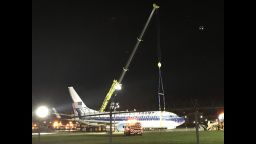 Crews worked through the night to free the plane.