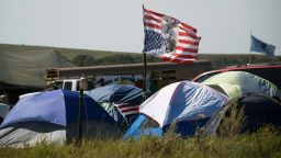 Tents and a flag are seen at an oil pipeline protest encampment near Cannon Ball, North Dakota where members of the Standing Rock Sioux tribe and their supporters have gathered to voice their opposition to the Dakota Access Pipeline (DAPL), September 3, 2016.
Drive on a state highway along the Missouri River, amid the rolling hills and wide prairies of North Dakota, and you'll come across a makeshift camp of Native Americans -- united by a common cause. Members of some 200 tribes have gathered here, many raising tribal flags that flap in the unforgiving wind. Some have been here since April, their numbers fluctuating between hundreds and thousands, in an unprecedented show of joint resistance to the nearly 1,200 mile-long Dakota Access oil pipeline.