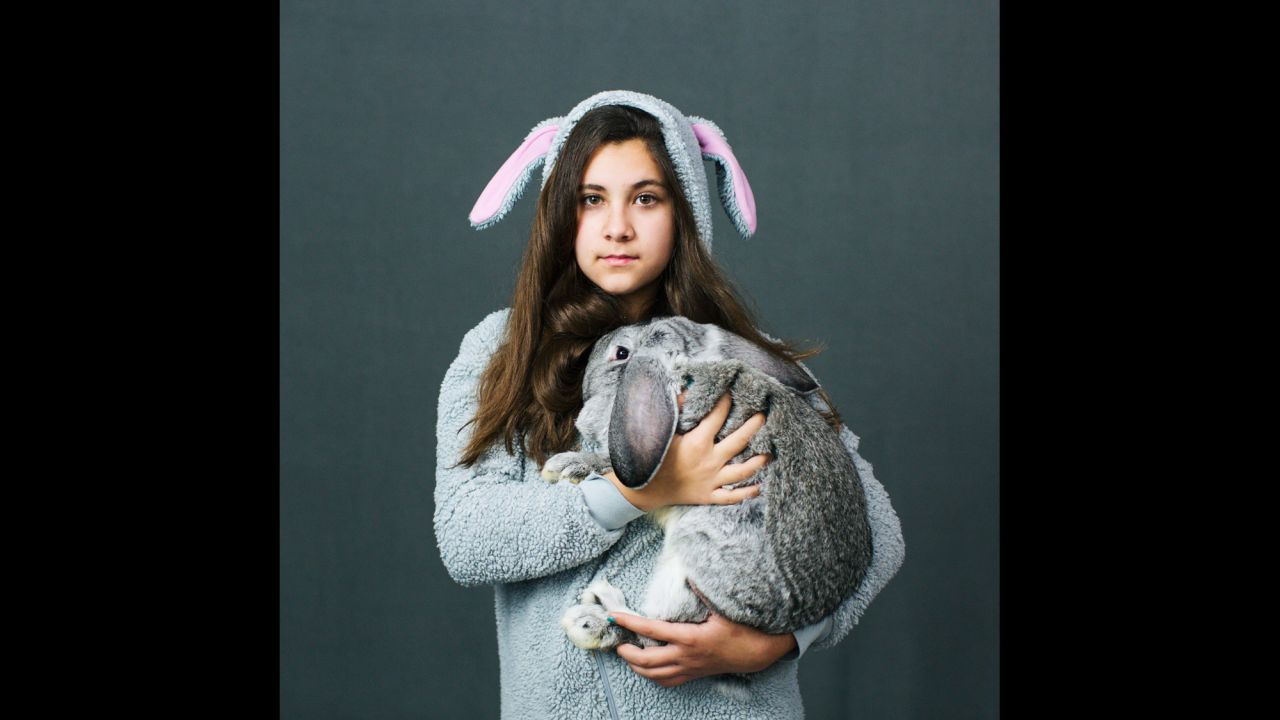Peyton Brackenbury, a 12-year-old from Richland, Washington, holds a French Lop rabbit at a national convention held by the American Rabbit Breeders Association.