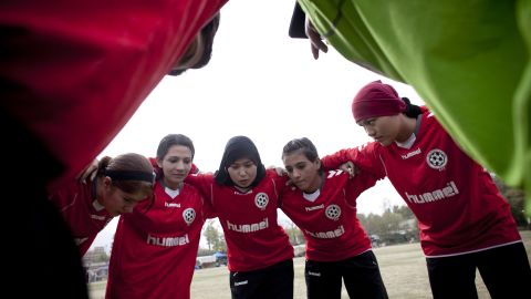 AFGHANISTAN, KABUL - OCTOBER 29:  Members of the Afghan women's national football team huddles during a match with the NATO-led International Security Assistance Force (ISAF) women's team in a friendly football match at the ISAF headquarters in Kabul on October 29, 2010 in Kabul, Afghanistan. The Afghan women's team won 1-0. (Photo by Majid Saeedi/Getty Images)