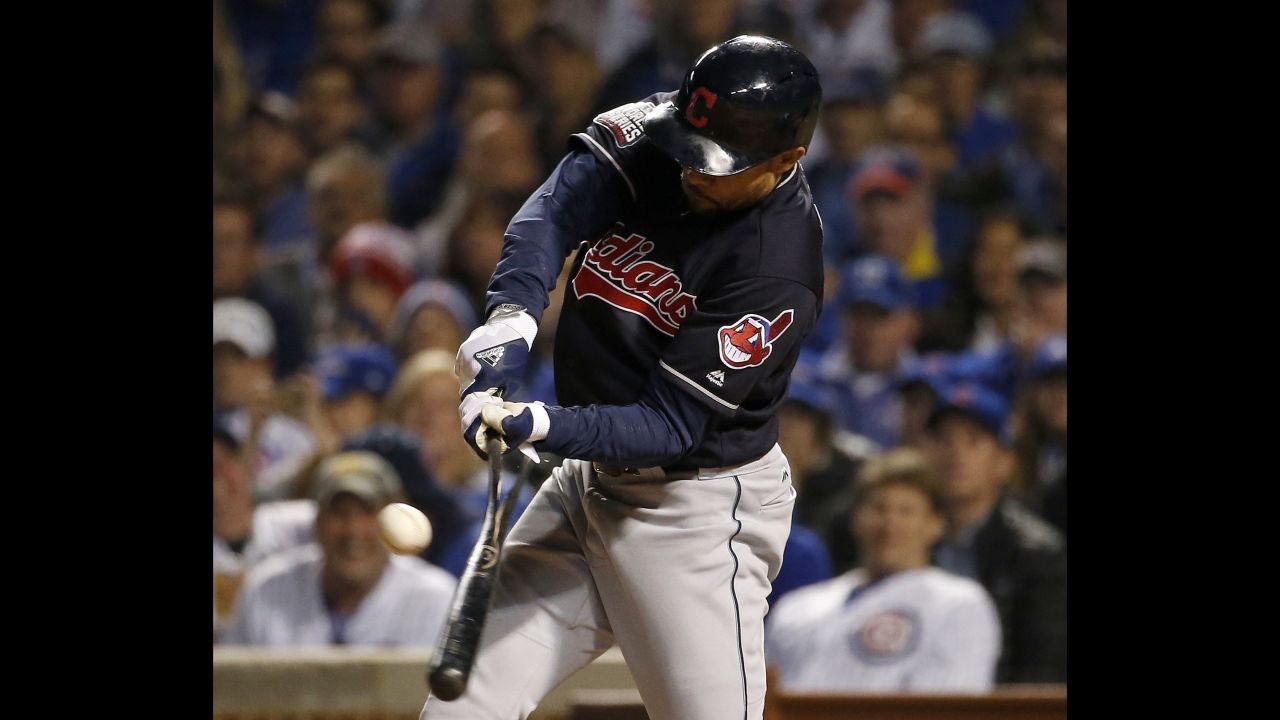Coco Crisp of the Indians breaks his bat hitting an RBI single during the seventh inning in Game 3.
