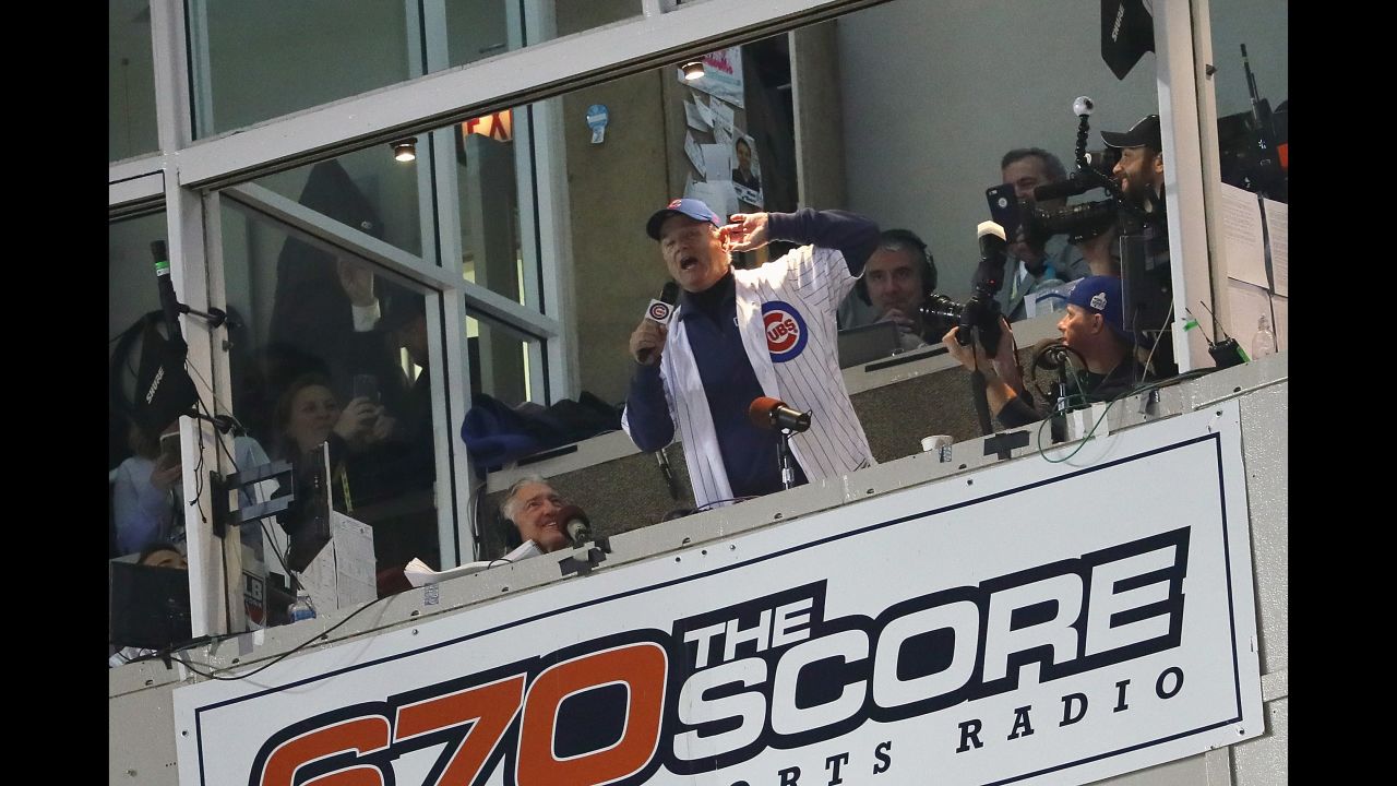 Actor Bill Murray sings "Take Me Out to the Ball Game" during the seventh inning stretch in Game 3.