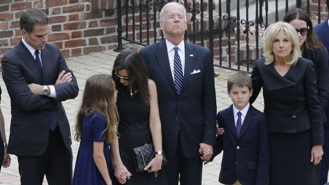 Biden pauses with his family as they enter a visitation for his son, former Delaware Attorney General Beau Biden, in June 2015. Biden's eldest son <a href="http://www.cnn.com/2015/06/04/politics/gallery/beau-biden-wake/index.html" target="_blank">died at the age of 46</a> after a battle with brain cancer.
