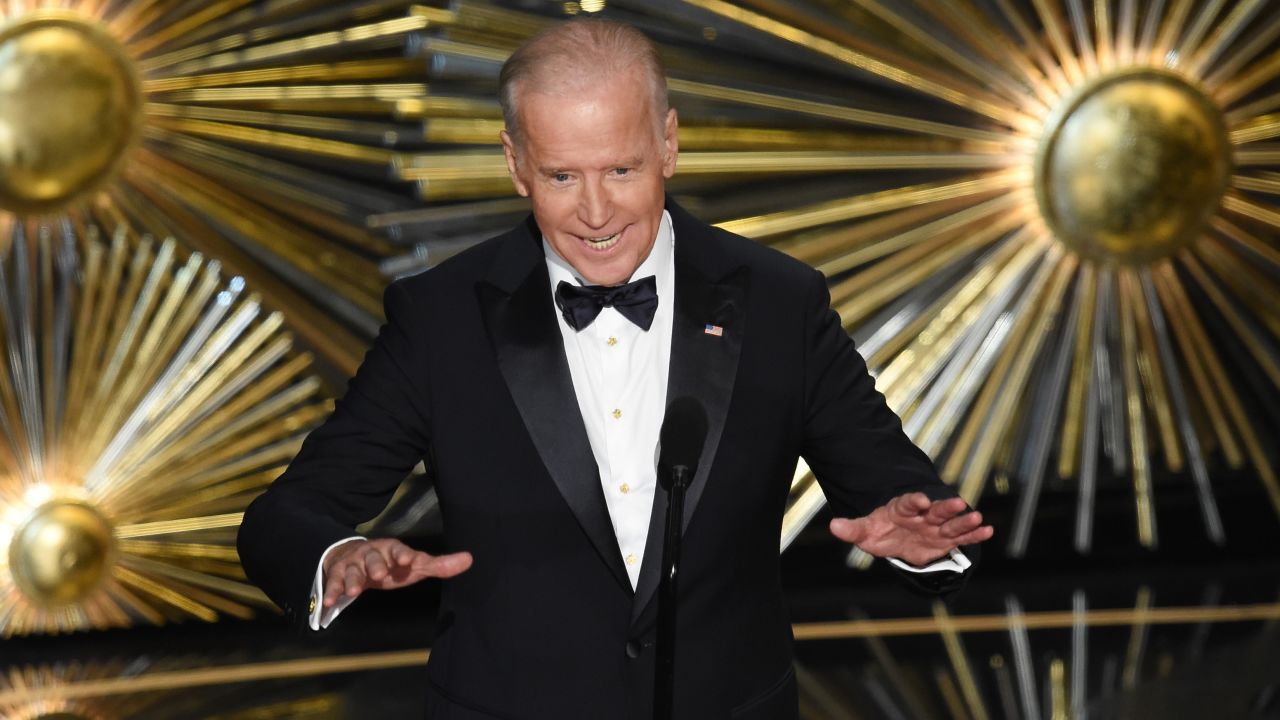 Biden speaks on stage during the Academy Awards in February
