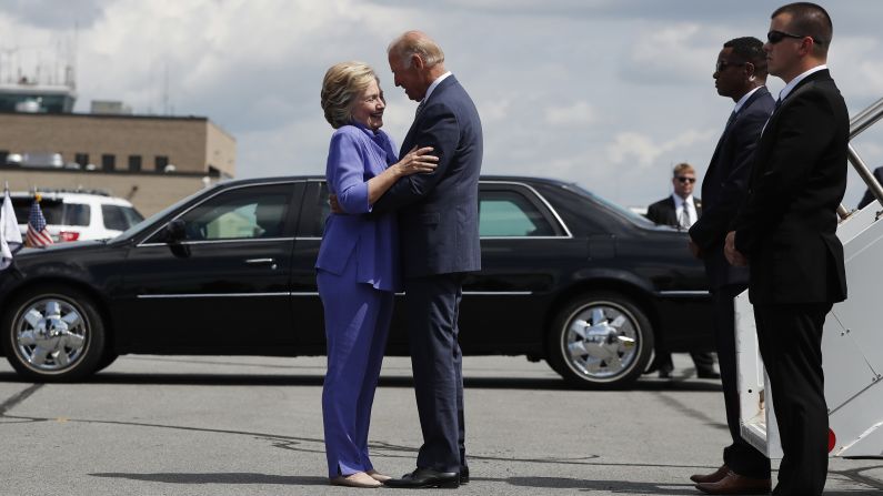 Democratic presidential nominee Hillary Clinton greets Biden on an airport tarmac in Avoca, Pennsylvania, in August 2016. <a href="index.php?page=&url=http%3A%2F%2Fwww.cnn.com%2Fvideos%2Fus%2F2016%2F08%2F17%2Fjoe-biden-endless-hug-moos-pkg-erin.cnn" target="_blank">Watch CNN's Jeanne Moos on the "endless embrace" </a>