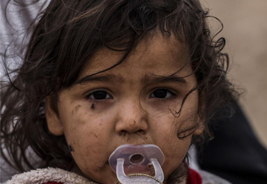An Iraqi girl, displaced by the battle to retake Mosul from ISIS, is pictured near Qayyarah on Friday. 