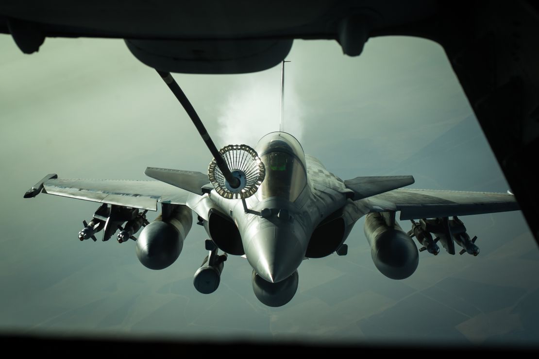 A French Dassault Rafale receives fuel from a KC-10 tanker in 2016. 