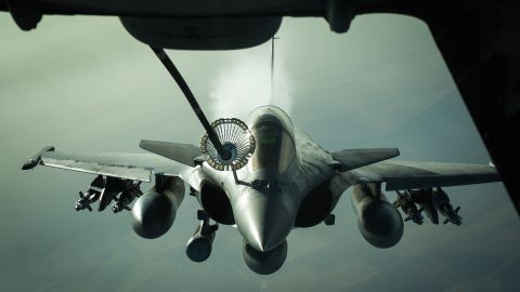 A French Rafale fighter is refueled in flight in 2016. The Dassault Rafale is a twin-engine, multi-role fighter and  has flown in combat missions in several countries including Afghanistan, Libya and Syria.