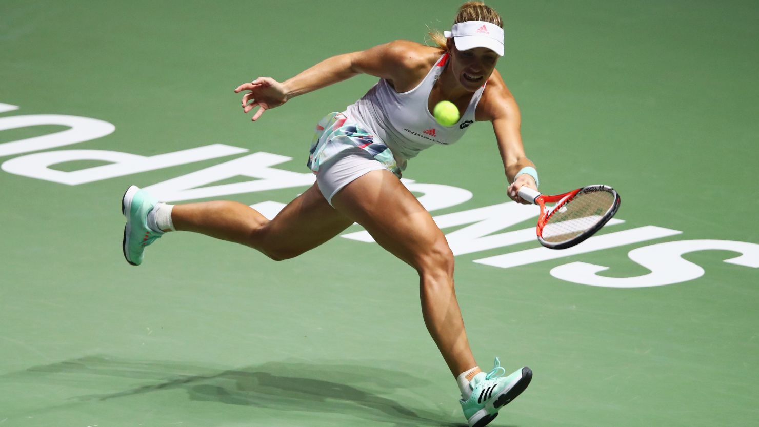 Angelique Kerber cruised past Agnieszka Radwanska to reach the WTA Finals in Singapore.