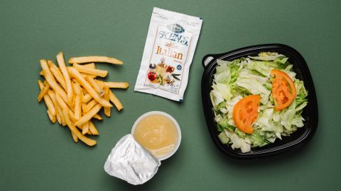 French fries and applesauce are vegan, but meal-wise, go for a garden side salad without cheese or croutons and with Golden Italian dressing. The ranch dressing contains egg yolk.