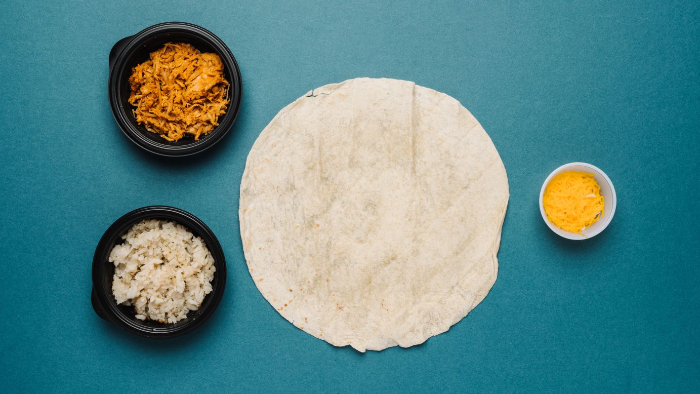 The shredded chicken burrito without avocado ranch sauce but with premium Latin rice and cheddar cheese offers a mix of protein and carbs, both necessary for strong, energized muscles, and delivers a healthy dose of performance-boosting iron.
