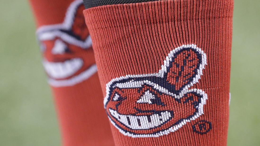 Cleveland Indians' Carlos Santana wears socks with the team logo before Game 4. 