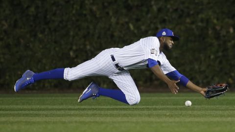 Chicago Cubs center fielder Dexter Fowler can't make the catch on a double hit by Cleveland Indians' Coco Crisp during the seventh inning of Game 4.