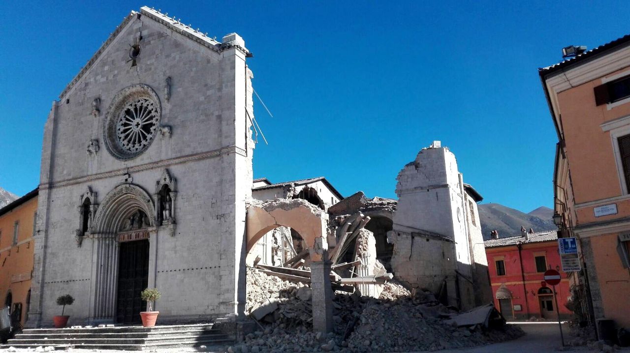 The facade of the Basilica of San Benedetto in Norcia remains standing on October 30, but much of its core has collapsed.