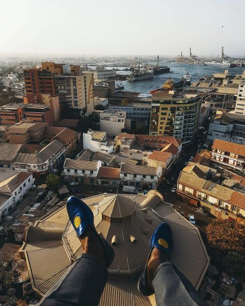 Dakar Lives has partnered with travel company Tastemakers Africa to curate unique tourism experiences in Senegal. Pictured, the view above Dakar's historic Kermel market. Photo by <a href="https://www.instagram.com/l.artrepreneur/?hl=en" target="_blank" target="_blank">@l.artrepreneur</a>.