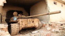 An old soviet era tank hidden in a house in the town of Tabzawa about 4 kilometers away from Mosul city, ISIS cut out the wall of the house and reversed the tank into it to avoid detection by collation forces fighter jets and drones. (Ghazi Balkiz/CNN)