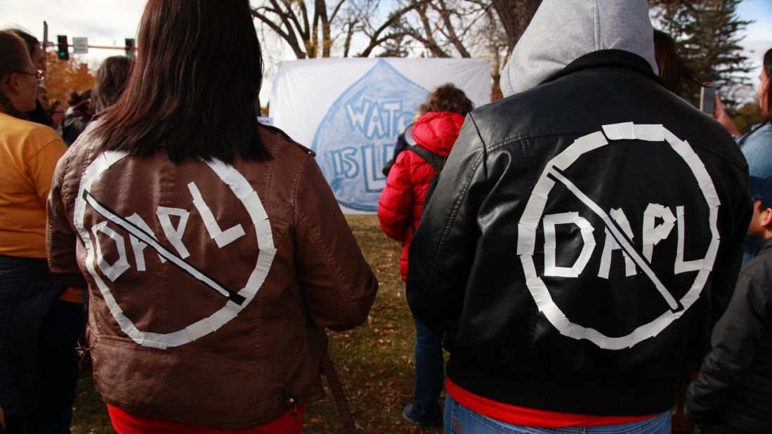 Cousins Jessica and Michelle Decoteau take part in a protest outside the North Dakota state capitol in Bismarck on October 29.