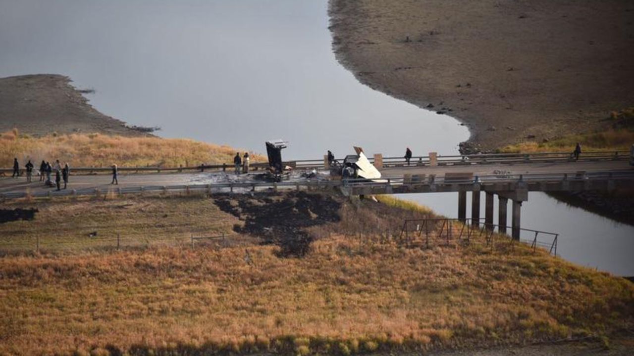 Police maintain a presence on Backwater Bridge.