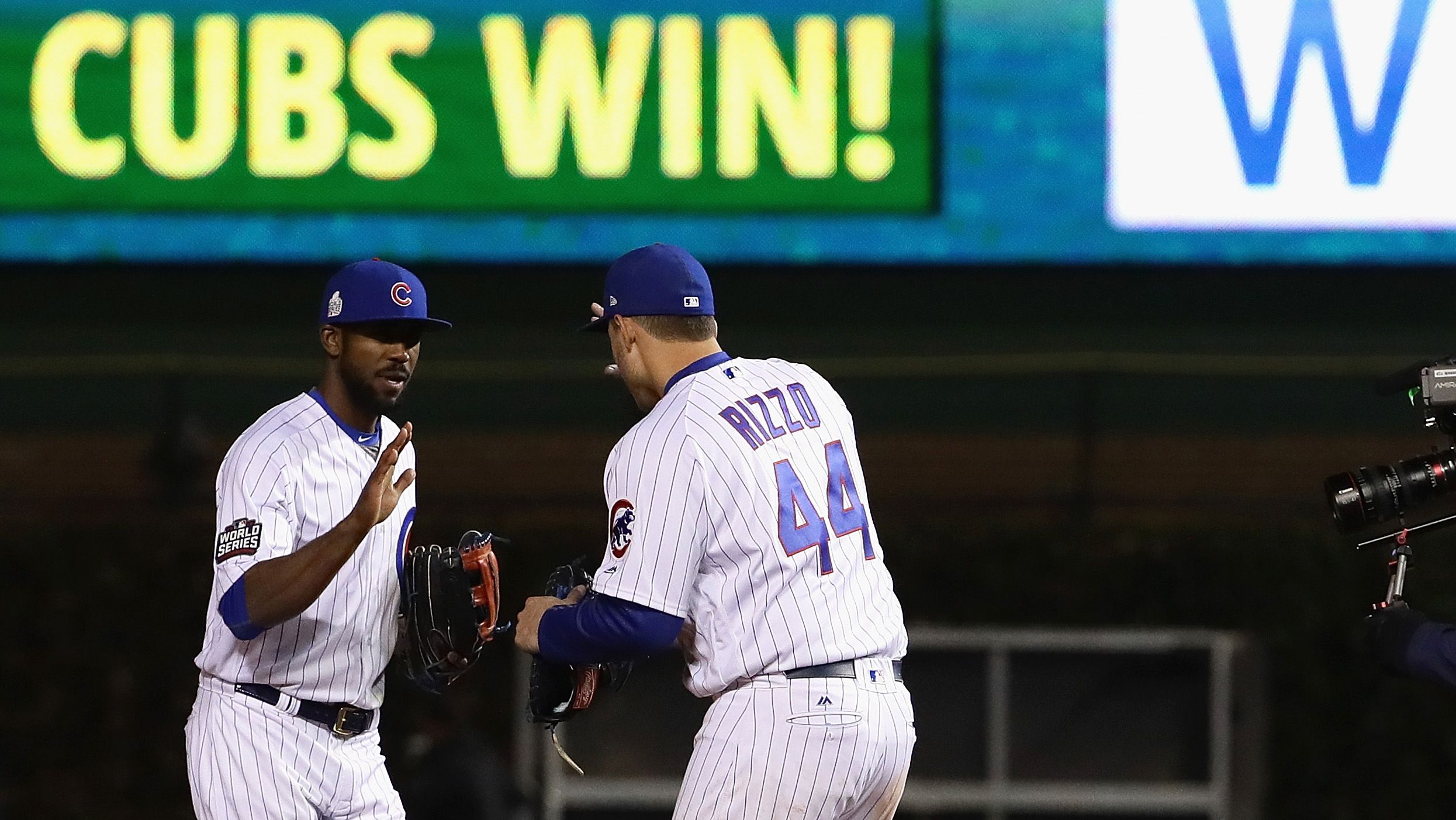 Chicago Cubs' Corey Patterson, right, watches his game-winning
