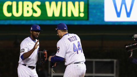 Dexter Fowler, left, and Anthony Rizzo, right, of the Cubs celebrate after beating the Indians 3-2 in Game 5.