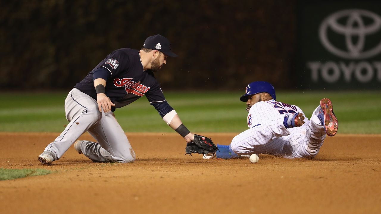 Jason Heyward of the Chicago Cubs steals second base past Jason Kipnis of the Cleveland Indians in the eighth inning in Game 5.